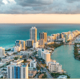 Images of skyscrapers towering by the waterfront
