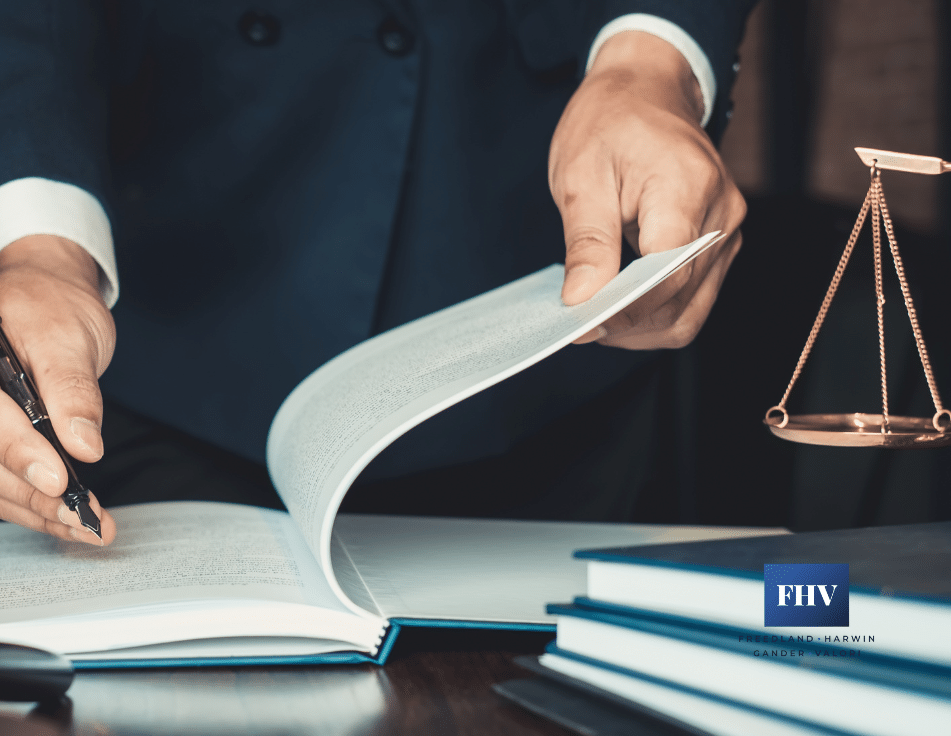 lawyer flipping through negligence and malpractice files
